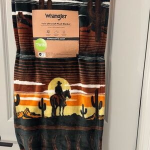 Wrangler Twin Plush Blanket with Cowboy and Cactus Design